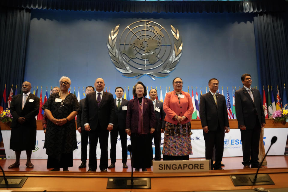 Front row from left, Samoa Prime Minister Fiame Naomi Mata'afa, Cook Islands Prime Minister Mark Stephen Brown, Under-Secretary-General of the United Nations and Executive Secretary of ESCAP Armida Salsiah Alisjahbana, Tonga Minister for Foreign Affairs and Minister for Tourism Fekitamoeloa Katoa 'Utoikamanu, Thailand Vice Minister for Foreign Affairs Vijavat Isarahakdi, Palau President Strangle S. Whipps Jr.. Second row from left, Republic of Fiji Assistant Minister office of the Prime Minister Sakiusa Tubuna, Embassy of Indonesia to Thailand Rachmat Budiman, Mongolia Head of human right Division Ankhbayar Nyamdorj, Kazakhstan vice minister of digital development, innovation and aerospace industry Askar Zhambakin, Cambodia Senior Minister & First Vice President, Cambodian Mine Action & Victim Assistance Authority Ly Thuch pose for group photo The 79th commission session of the Economic and Social Commission for Asia and the Pacific (ESCAP) at U.N. regional office in Bangkok, Thailand, Monday, May 15, 2023. Pacific Island leaders called at a U.N. climate change conference in Thailand for more efforts by rich countries to combat global warming environmental impact, especially as their vulnerable countries are just emerging from the economic devastation of the COVID-19 pandemic. (AP Photo/Sakchai Lalit)