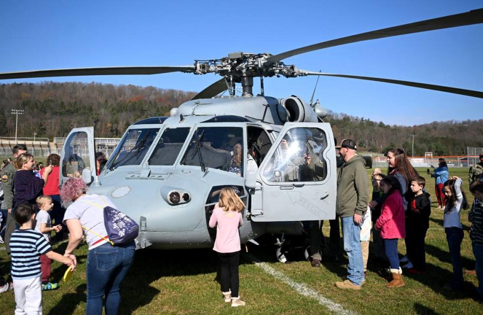 Bald Eagle Area elementary students get to explore the VX-1 Pioneers MH-60S helicopters that were flown in for the Veterans Day celebration on Thursday, Nov. 9, 2023. Abby Drey/adrey@centredaily.com