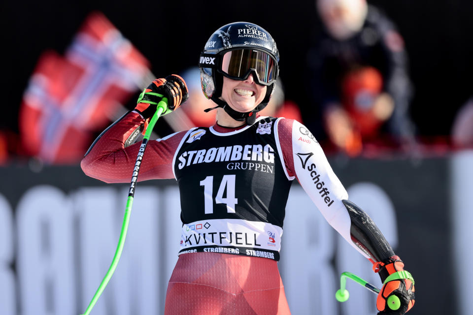 Austria's Cornelia Huetter celebrates at the finish line after an alpine ski, women's World Cup Super G race in Kvitfjell, Norway, Friday, March 3, 2023. (Geir Olsen/NTB via AP)