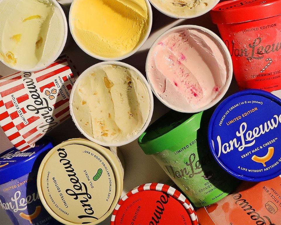 An overhead shot of various Van Leeuwen ice cream pints both open and closed