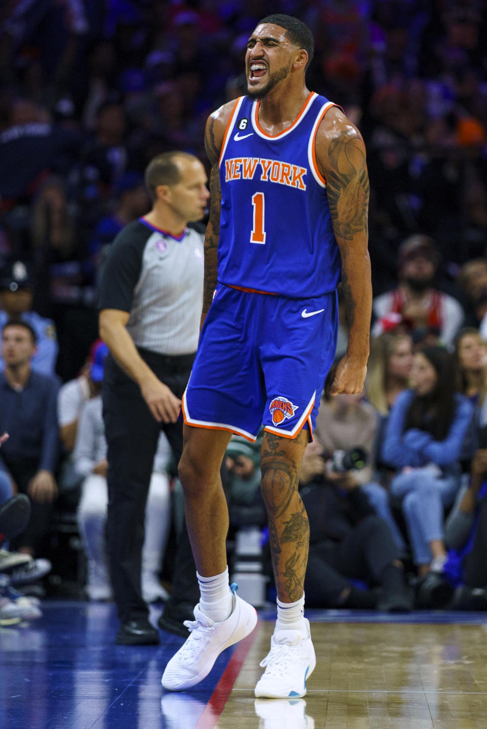 New York Knicks' Obi Toppin celebrates a 3-pointer during the second half of the team's NBA basketball game against the Philadelphia 76ers, Friday, Nov. 4, 2022, in Philadelphia. The Knicks won 106-104. (AP Photo/Chris Szagola)