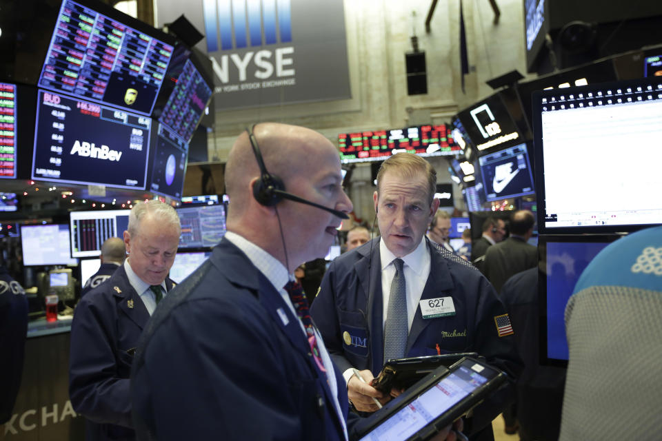 Traders work on the floor of the New York Stock Exchange on Monday, Dec. 24, 2018. (AP Photo/Seth Wenig)