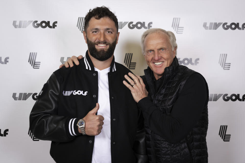 In a photo provided by LIV Golf, Jon Rahm, left, and LIV Golf Commissioner and CEO Greg Norman pose for a photo in New York on Thursday, Dec. 7, 2023. Rahm announced Thursday he's joining LIV Golf. (Photo by Scott Taetsch/LIV Golf via AP)