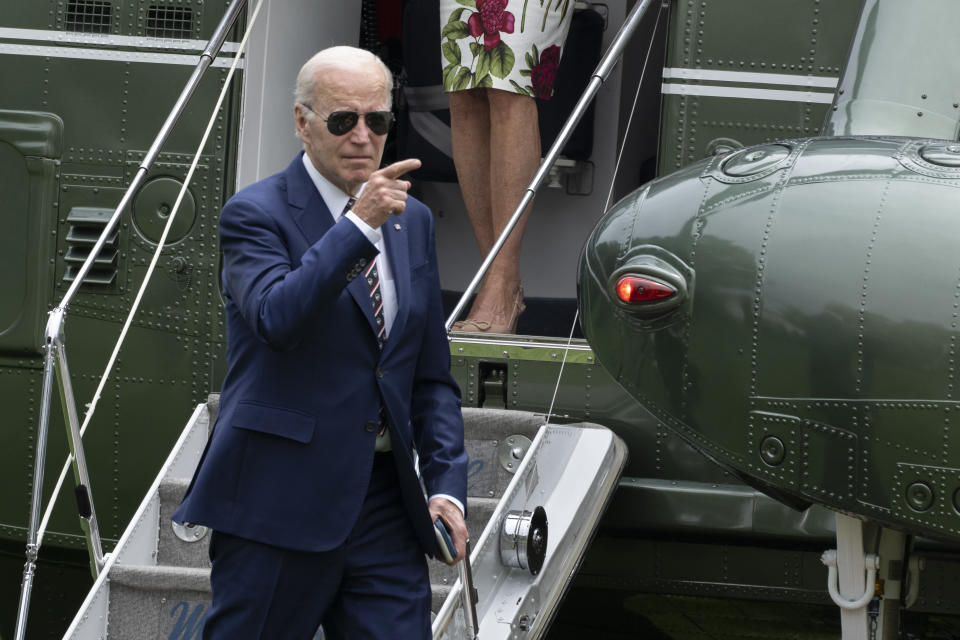 President Joe Biden arrives at the White House with first lady Jill Biden in Washington, Sunday, May 28, 2023, after he and the first lady were in Delaware to watch granddaughter Natalie Biden graduate from high school. Biden and House Speaker Kevin McCarthy came to an “agreement in principle” on the debt limit Saturday that would avert a potentially disastrous U.S. default, but still has to pass both houses of Congress. (AP Photo/Manuel Balce Ceneta)