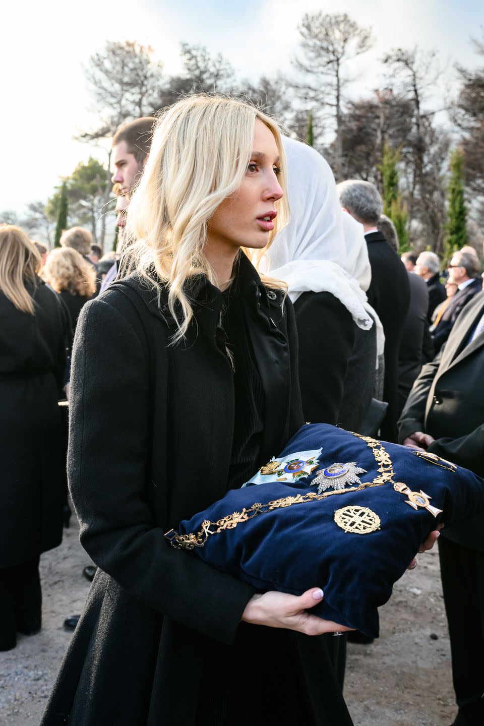 <p>Following the service, a more intimate group traveled to a graveside service at Tatoi cemetery. Pictured here is Princess Maria Olympia.</p>