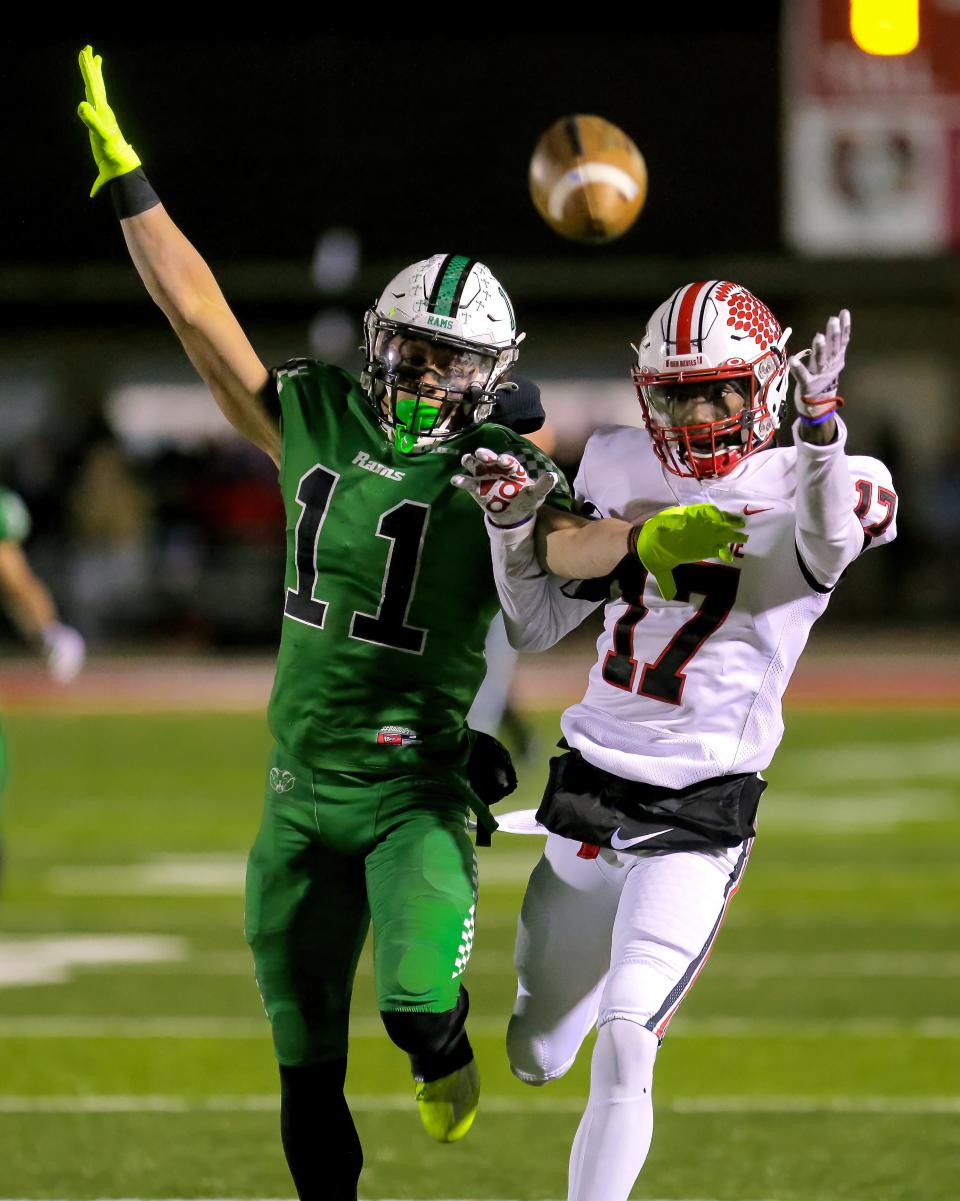 Badin's Braedyn Moore (11) denies a reception to Tippecanoe's Stanley Clyme (17) during a defensive battle during a Division III regional final at Trotwood High School on Nov. 18. Moore will next play for the University of Cincinnati.