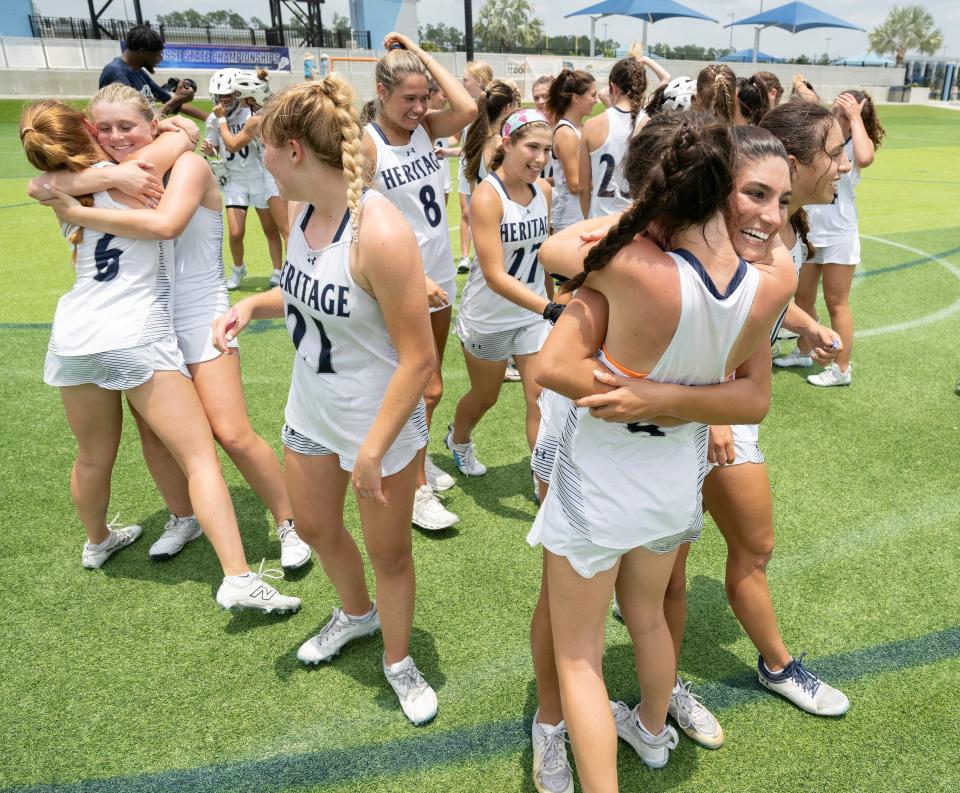 American Heritage players celebrate winning the state championship over Lake Highland Prep during their Class 1A state championship game in Naples on Saturday, May 11, 2024. Photo by Darron R, Silva/Special to USA Today Network-Florida