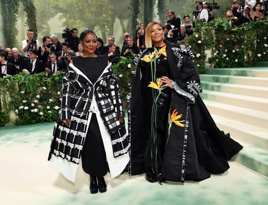 (Left to right) Eboni Nichols and Queen Latifah attend The 2024 Met Gala Celebrating “Sleeping Beauties: Reawakening Fashion” at The Metropolitan Museum of Art on May 06, 2024 in New York City. (Photo by Jamie McCarthy/Getty Images)