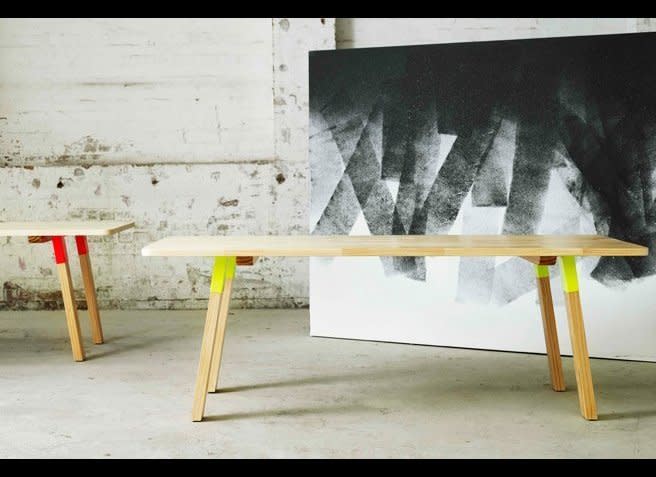 Use a pop of neon to give plain, wooden furniture more appeal. The yellow on <a href="http://www.koskela.com.au/pbs-table/" target="_hplink">this coffee table</a> looks striking without being too intense.