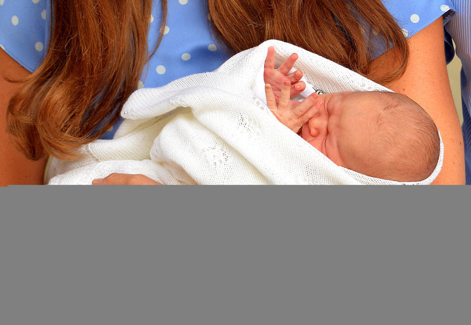 The safe hands of the Duchess of Cambridge with her son who was born yesterday, leave the Lindo Wing of St Mary's Hospital in west London.