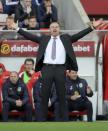 <p>Burnley manager Sean Dyche signals to players during their match against Sunderland during the English Premier League soccer match at the Stadium of Light stadium in Sunderland, England, Saturday March 18, 2017. (Richard Sellers/PA via AP) </p>