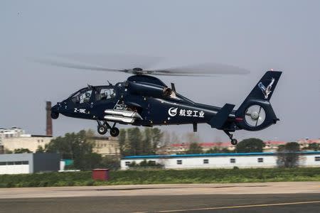 Chinese-developed attack helicopter Z-19E is pictured during its maiden flight in Harbin, Heilongjiang province, China May 18, 2017. China Daily/via REUTERS