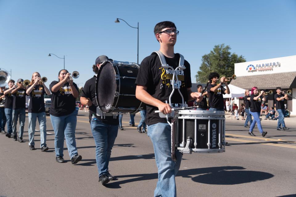 The Booker High School Marching Band marches down Main Street at the 104th annual Wheatheart of the Nation Parade Saturday in Perryton.
