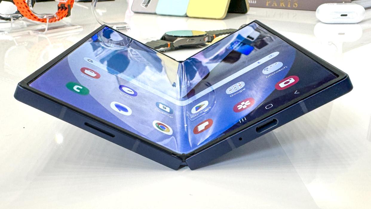  Samsung Galaxy Z Fold 6 half folded on table. 