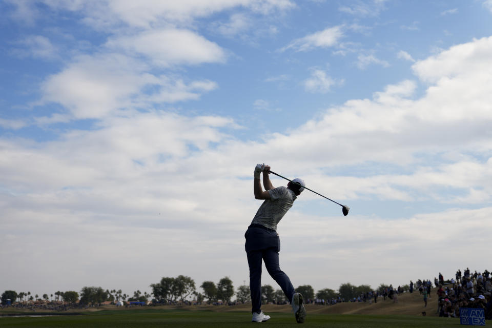 Nick Dunlap hits his tee shot on the fifth hole of the Pete Dye Stadium Course during the final round of the American Express golf tournament, Sunday, Jan. 21, 2024, in La Quinta, Calif. (AP Photo/Ryan Sun)