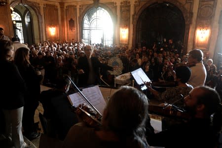 Musicians perform during the wake of Brazilian singer Joao Gilberto in Rio de Janeiro's Municipal Theater