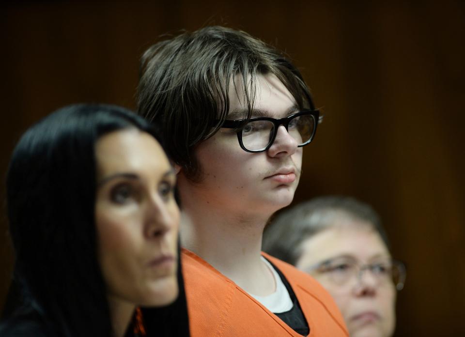 Ethan Crumbley stands with his attorneys, Paulette Loftin and Amy Hopp during his hearing at Oakland County Circuit Court, Tuesday, Aug. 1, 2023 in Pontiac, Mich.