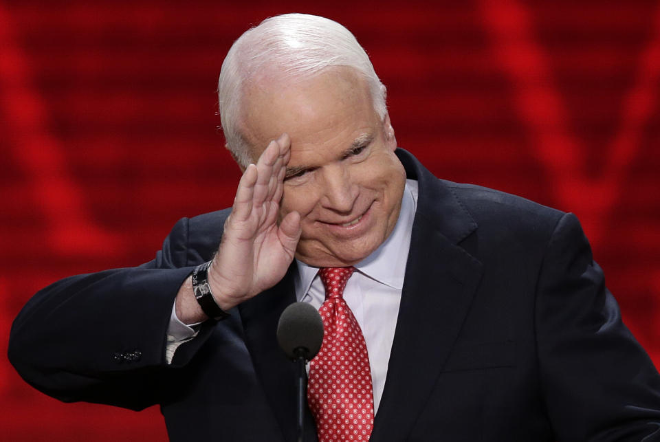 Sen. John McCain, R-Ariz., salutes before addressing the Republican National Convention in Tampa, Fla., on Wednesday, Aug. 29, 2012. (AP Photo/J. Scott Applewhite)