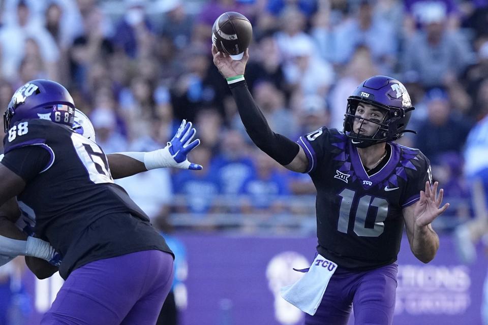 TCU quarterback Josh Hoover (10) passes during the second half of an NCAA college football game against BYU Saturday, Oct. 14, 2023, in Fort Worth, Texas. | LM Otero, Associated Press