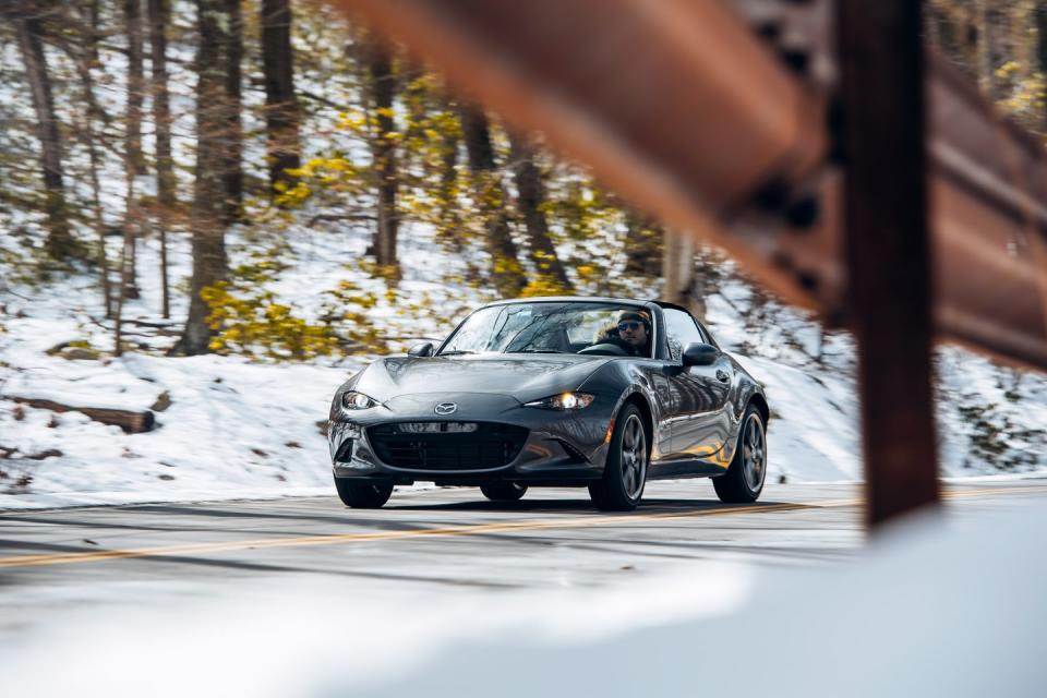 <p>There's no arguing the versatility of the <a href="https://www.roadandtrack.com/new-cars/first-drives/a32413/the-rf-is-the-miata-for-you-in-twenty-years/" rel="nofollow noopener" target="_blank" data-ylk="slk:Mazda Miata;elm:context_link;itc:0;sec:content-canvas" class="link ">Mazda Miata</a>. It's one of the greatest sports cars on the planet, but also does well as a daily driver. The simplicity, good gas mileage, and small costs the Miata has to offer mean people will be commuting in them for years to come. <a href="https://www.ebay.com/itm/2018-Mazda-MX-5-Miata-RF/193196964503?hash=item2cfb6fba97:g:nh0AAOSwjZFdw5jp" rel="nofollow noopener" target="_blank" data-ylk="slk:This low-mile RF model;elm:context_link;itc:0;sec:content-canvas" class="link ">This low-mile RF model</a> is up for sale on eBay. </p>