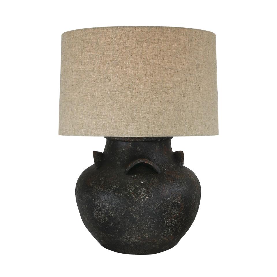 <p><a href="https://nateberkus.com/products/blackened-terra-cotta-pot-table-lamp" rel="nofollow noopener" target="_blank" data-ylk="slk:Shop Now;elm:context_link;itc:0;sec:content-canvas" class="link ">Shop Now</a></p><p>Blackened Terra Cotta Pot Table Lamp</p><p>$325.00</p><p>nateberkus.com</p><span class="copyright">Nate Berkus Home</span>