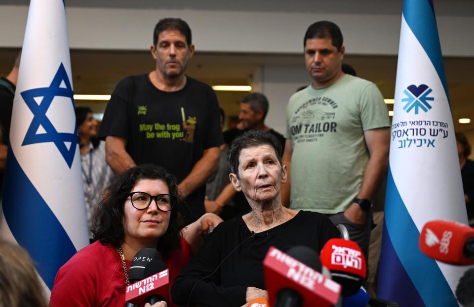 Yocheved Lifshitz (C) speaks to the media alongside her daughter Sharone Lifschitz (L) outside Ichilov Hospital after she was released by Hamas last night, on October 23, 2023 in Tel Aviv, Israel.