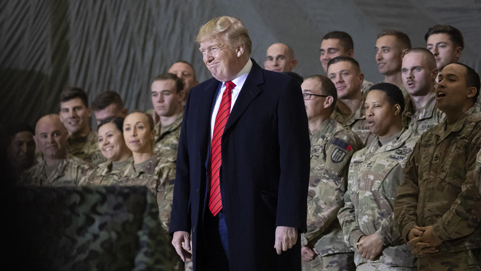 President Donald Trump smiles before addressing members of the military during a surprise Thanksgiving Day visit, Thursday, Nov. 28, 2019, at Bagram Air Field, Afghanistan. (AP Photo/Alex Brandon)