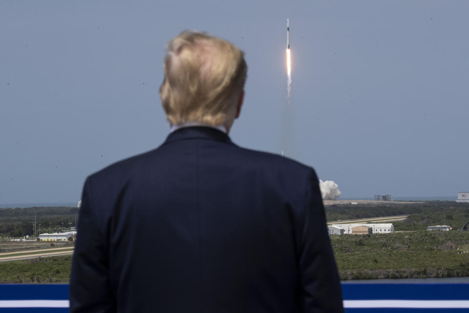 President Donald Trump views the SpaceX flight to the International Space Station, at Kennedy Space Center, Saturday, May 30, 2020, in Cape Canaveral, Fla. (AP Photo/Alex Brandon)