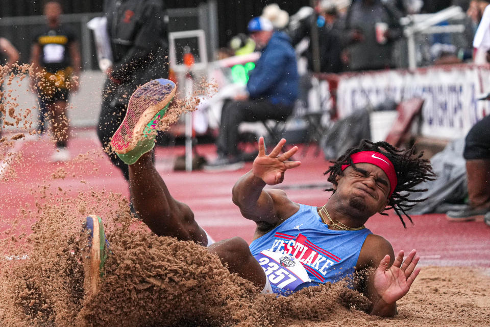 Westlake's Ashton Torns competes in the long jump Saturday at the state meet. He added a gold medal to the state gold he won as a sophomore and the silver he won last year.