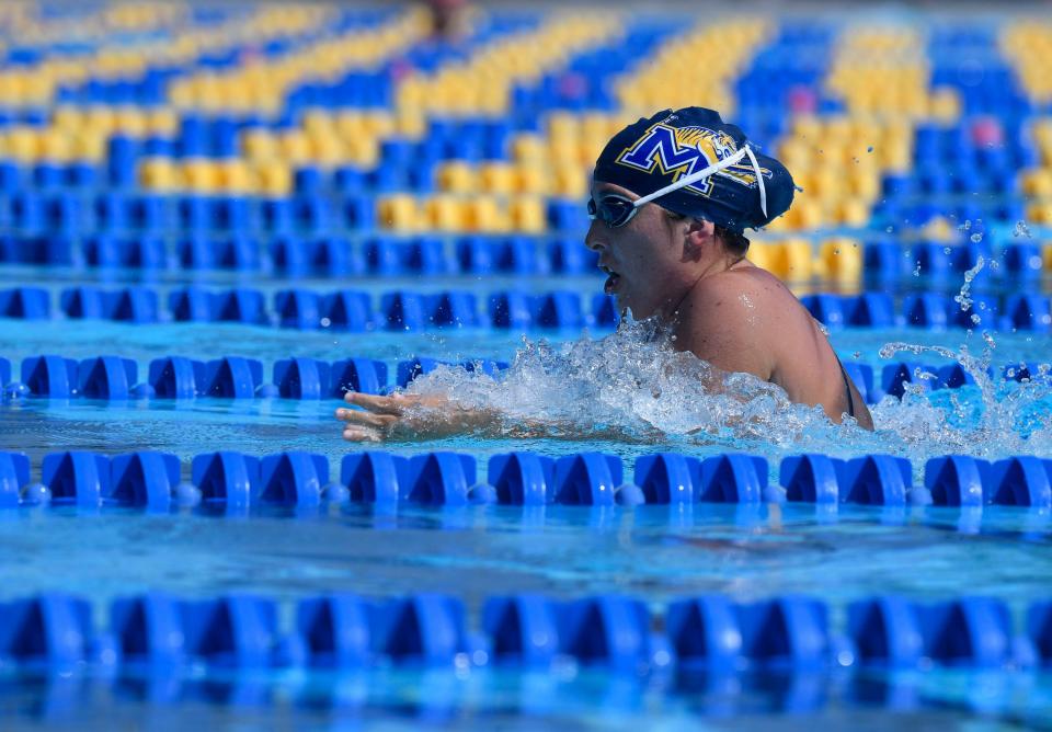 Martin County’s Lauren Feeney competes in the 100 Yard Breaststroke during a high school swim meet, Saturday, Sept. 23, 2023, at Indian River State College’s Anne Wilder Aquatic Complex in Fort Pierce.