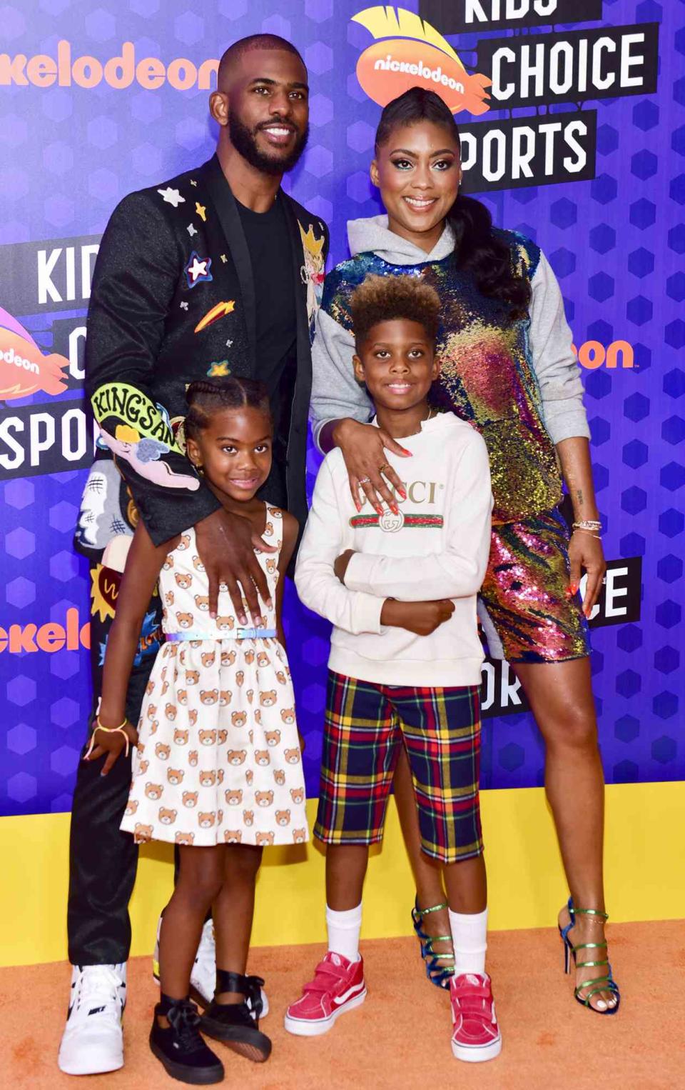 Chris Paul, Camryn Alexis Paul, Christopher Emmanuel Paul II, and Jada Crawley attend Nickelodeon Kids' Choice Sports Awards 2018 at Barker Hangar on July 19, 2018 in Santa Monica, California