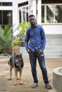 In this photo taken Friday, March 27, 2020, Ugandan musician, lawmaker and presidential aspirant Bobi Wine, whose real name is Kyagulanyi Ssentamu, speaks to The Associated Press in Kampala, Uganda. Wine, who released a song in March 2020 urging Africa's people to wash their hands to stop the spread of the new coronavirus, is criticizing African governments for not maintaining better health care systems for the continent's 1.3 billion people while investing in weapons and "curtailing the voices of the people". (AP Photo/Ronald Kabuubi)