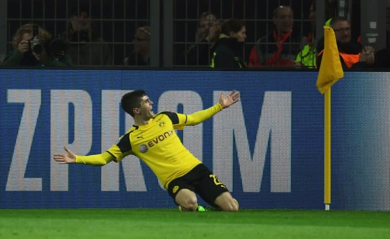 Borussia Dortmund's Christian Pulisic celebrates scoring a goal during their UEFA Champions League match against Benfica, in Dortmund, on March 8, 2017