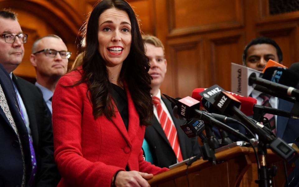 Jacinda Ardern speaks with her front bench at her first press conference at Parliament in Wellington on August 1, 2017 - AFP