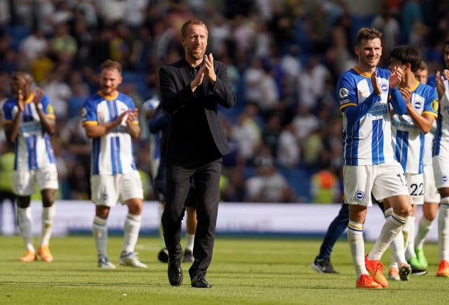 Graham Potter, centre, celebrates with Brighton