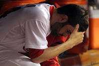 ST LOUIS, MO - OCTOBER 27: Jaime Garcia #54 of the St. Louis Cardinals sits in the dugout during Game Six of the MLB World Series against the Texas Rangers at Busch Stadium on October 27, 2011 in St Louis, Missouri. (Photo by Jamie Squire/Getty Images)