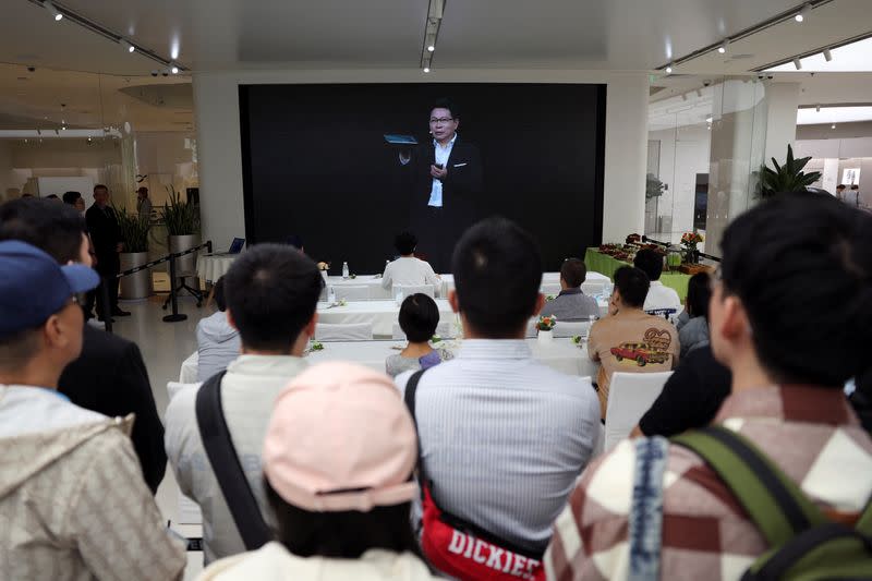 Huawei's Richard Yu on a screen at a flagship store in Beijing