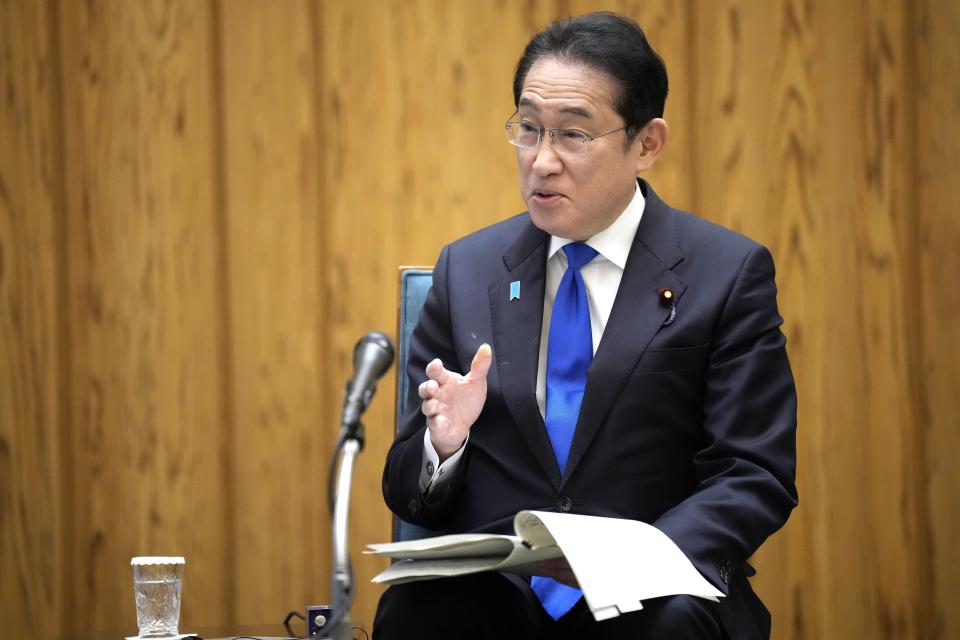 Japan's Prime Minister Fumio Kishida speaks during an interview with foreign media members ahead of an official visit to the United States at the Prime Minister's official residence Friday, April 5, 2024, in Tokyo. (AP Photo/Eugene Hoshiko)