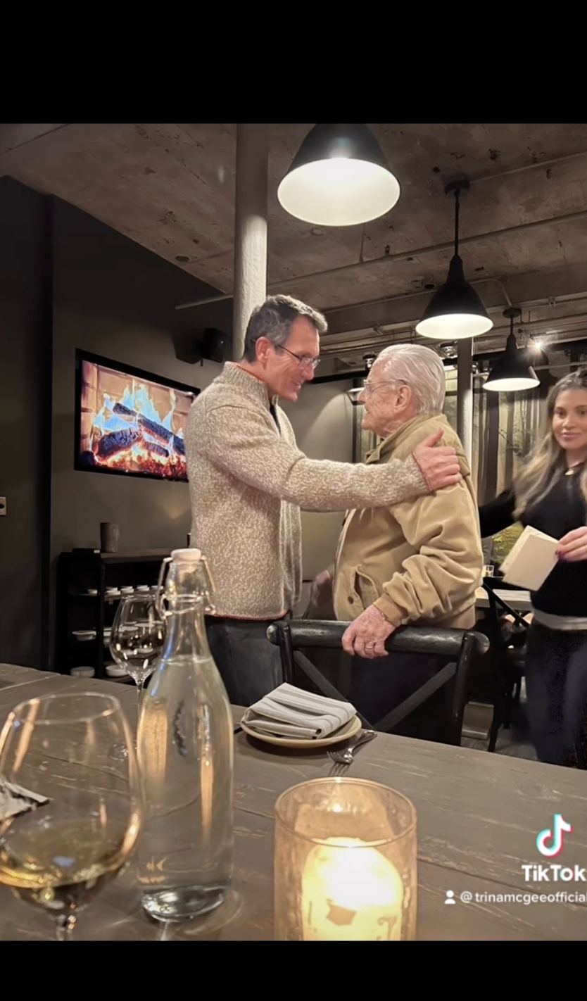 Anthony Tyler Quinn, who played Mr. Turner, hugs William Daniels, with a surprise appearance from Danielle Fishel.  (@trinamcgeeofficial / TikTok)