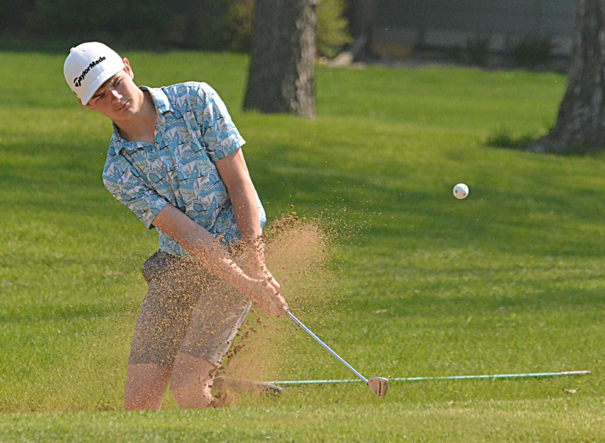Briggs LaBrie of Doland hits out of a bunker on No. 5 Yellow during the Pre-Region 1B/Eastern Coteau Conference golf tournament on Monday, May 13, 2024 at Cattail Crossing Golf Course.