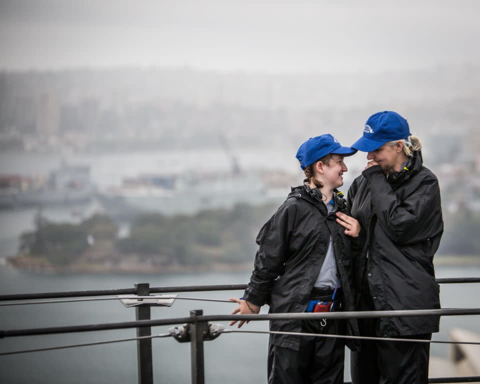 Sophie Clayton climbs the Sydney Harbour Bridge with her mum Amanda. Photo: BridgeClimb