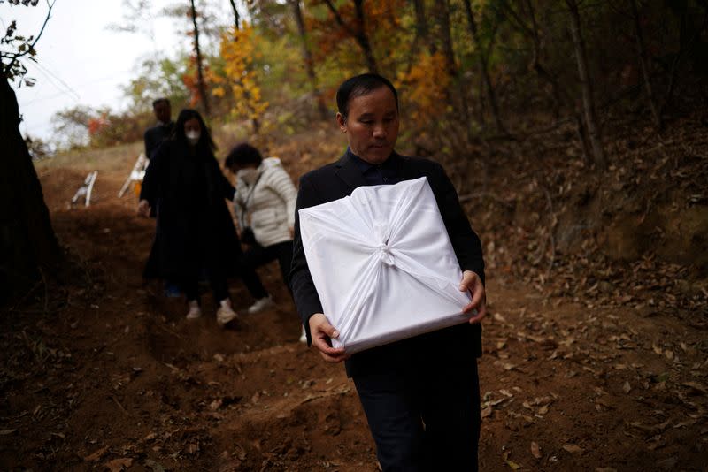 South Korean parents bury children killed in Halloween disaster