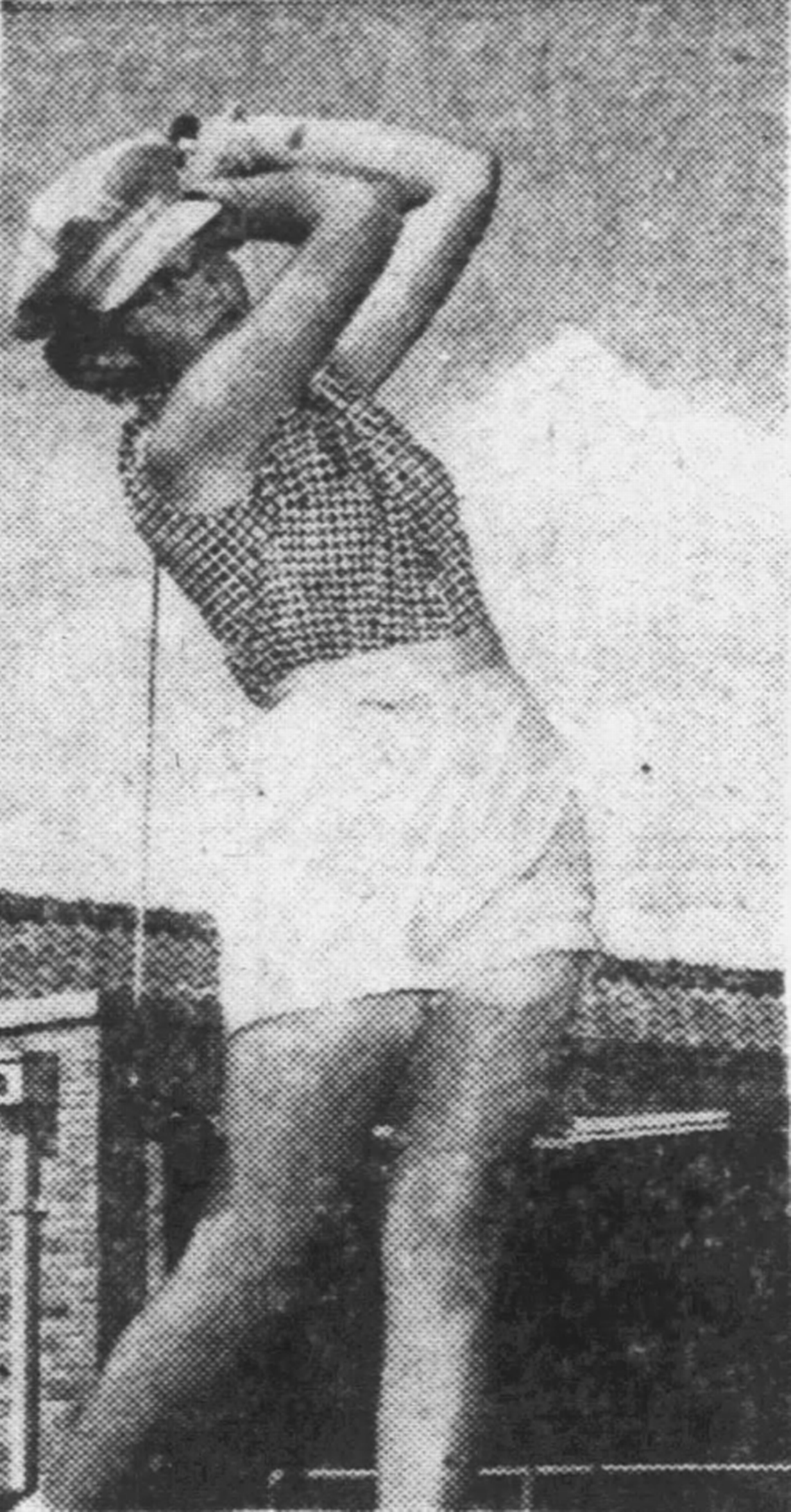 Judy Bell poses after a tee shot in a 1954 tournament in Wichita. She later became the first woman to become the President of the USGA.