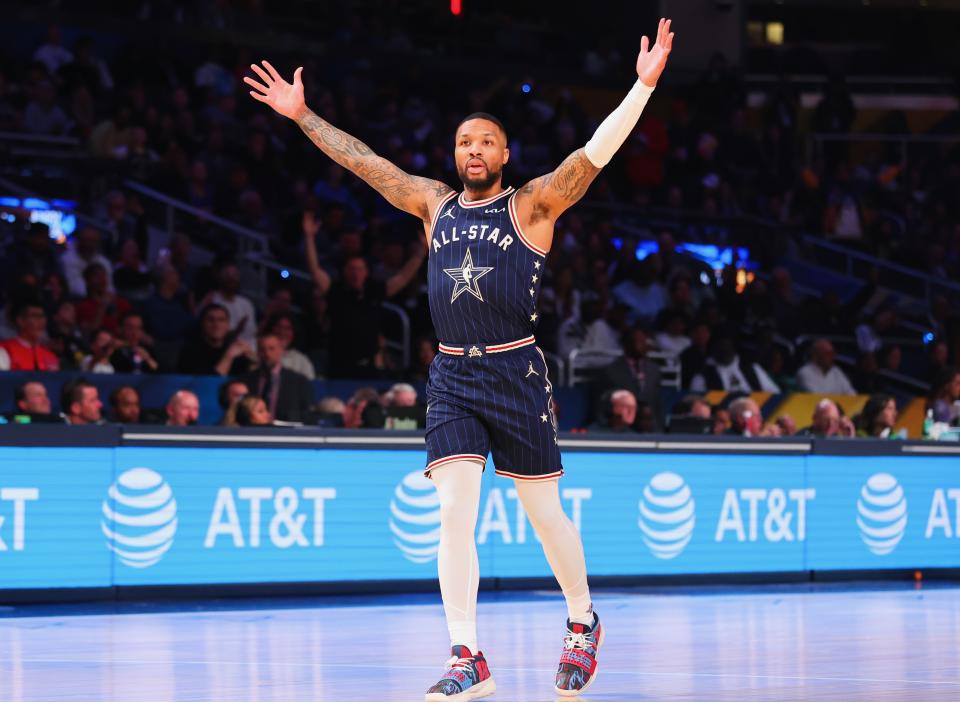 NBA 3-point champion Damian Lillard remained on fire in Sunday's All-Star Game. (Stacy Revere/Getty Images)