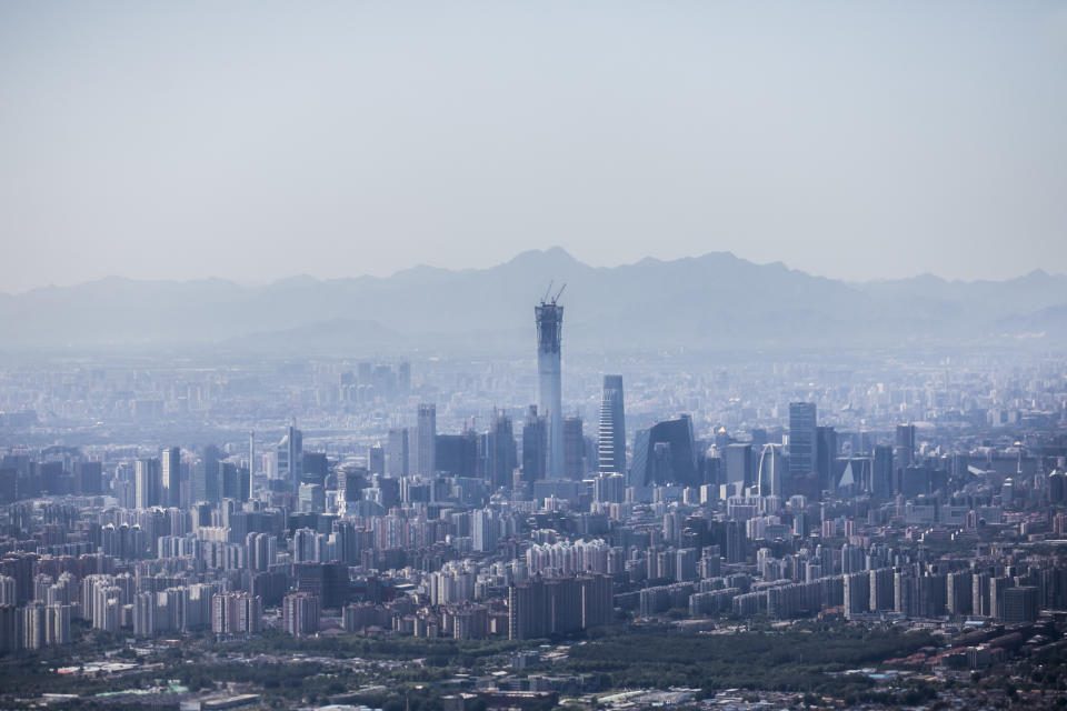 The photo shows an aerial view of Beijing city centre in China.