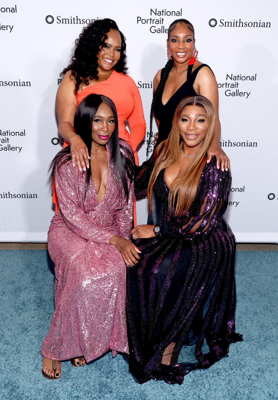 Venus Williams, Isha Price, Lyndrea Price and Serena Williams  (Paul Morigi / Getty Images)