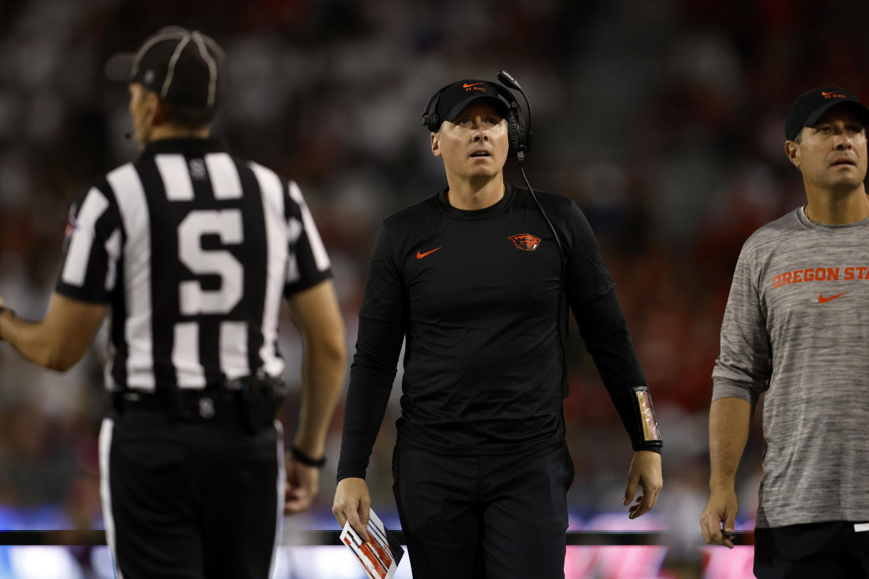 TUCSON, ARIZONA - OCTOBER 28: Defensive coordinator Trent Bray of the Oregon State Beavers watches a replay during the game against the Arizona Wildcats at Arizona Stadium on October 28, 2023 in Tucson, Arizona. The Wildcats defeated the Beavers 27-24. (Photo by Chris Coduto/Getty Images)