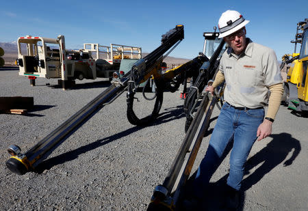 David Swisher, Vice President of Operations at Nevada Copper's Pumpkin Hollow copper mine, describes a piece of equipment in Yerington, Nevada, U.S., January 10, 2019. REUTERS/Bob Strong