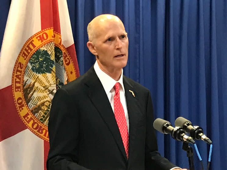 Florida Gov. Rick Scott holds a press conference. (Photo: Joe Reedy/AP)