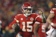 Kansas City Chiefs quarterback Patrick Mahomes (15) scrambles up field during the second half of an NFL wild-card playoff football game against the Pittsburgh Steelers, Sunday, Jan. 16, 2022, in Kansas City, Mo. (AP Photo/Travis Heying)